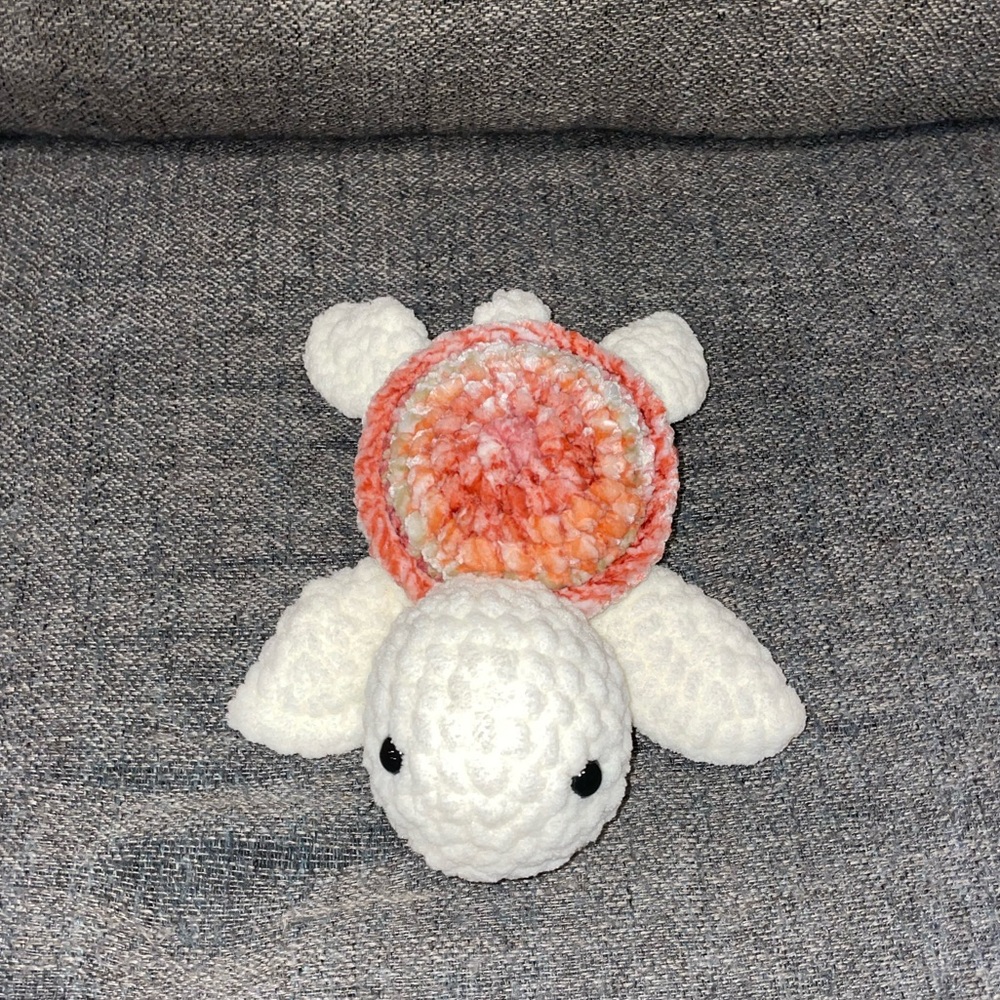 Small crocheted turtle plushie